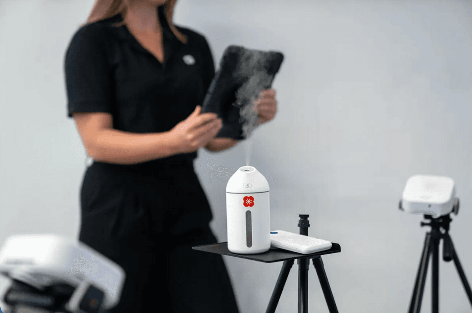 Poppy technician conducting real-time air tracer testing with nebulized device